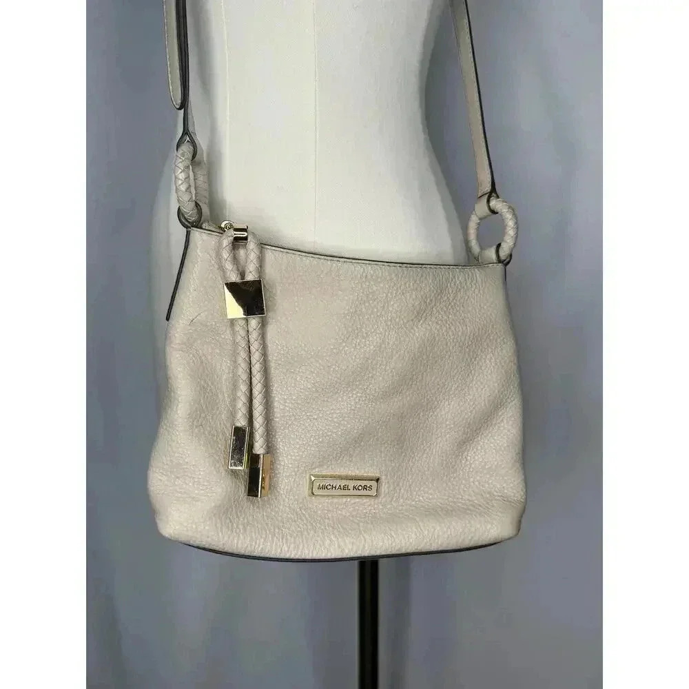 Michael Kors pebble leather tassel crossbody bag - Picture 2 of 15